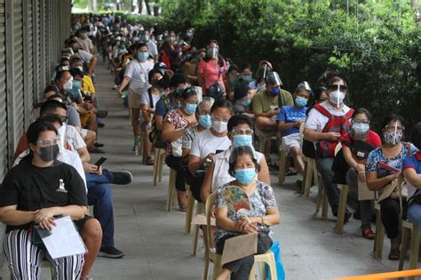 manilacovid19vaccine|Manileños sign up for free shots promised by city hall.